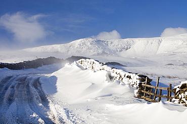 Red Screes and the Kirkstone Pass road blocked by snow in the Lake District, Cumbria, England, United Kingdom, Europe