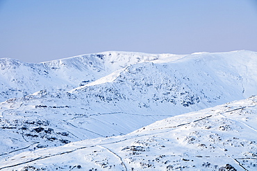 Fairfield covered in snow at sunset from Wansfell in the Lake District, Cumbria, England, United Kingdom, Europe