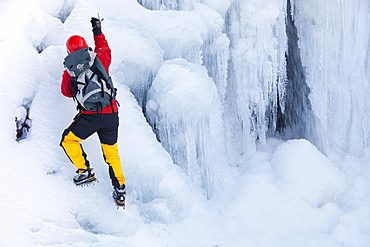 The mountaineer, Mike Withers, ice climbing in Fisher Place gill above Thilrmere in the Lake District, Cumbria, England, United Kingdom, Europe