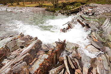 A weir destroyed by floods that devastated Cumbria in 2009, on the River Brathay in Langdale at Elterwater in the Lake District, Cumbria, England, United Kingdom, Europe