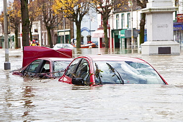 Flooded cars on Cockermouth's Main Street, Cumbria, England, United Kingdom, Europe