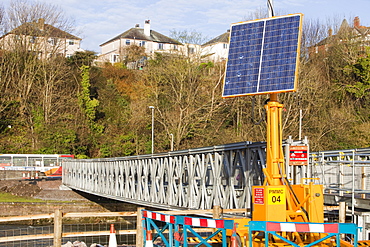 Footbridge installed by the army to reconnect the two halves of the town. and named the Barker Crossing after PC Bill Barker who lost his life when Workington's main road bridge was destroyed, Workington, Cumbria, England, United Kingdom, Europe