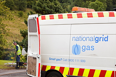 Workers from British Gas replacing old metal gas pipes with plastic piping in Ambleside, Cumbria, England, United Kingdom, Europe