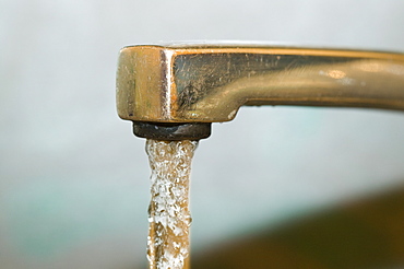 Water running out of a household tap