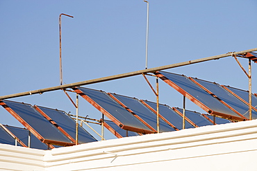 Solar water heating panels on the roof of a launderette in Teos, Turkey, Eurasia