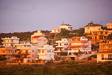 Houses bathed in late evening light in Teos, Western Turkey, Eurasia