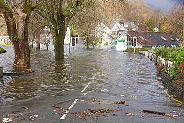 Lake Windermere at its highest ever recorded level and flooded buildings in Ambleside, Lake District, Cumbria, England, United Kingdom, Europe