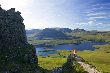 A climber on Stac Pollaidh in Assynt, Sutherland, Scotland, United Kingdom, Europe