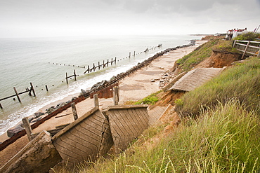 The lifeboat launching ramp destroyed as waves crashing against the coast at Happisburgh on the fastest eroding section of the UK coast, Norfolk, England, United Kingdom, Europe