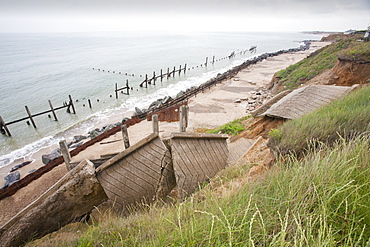 The lifeboat launching ramp destroyed as waves crashing against the coast at Happisburgh on the fastest eroding section of the UK coast, Norfolk, England, United Kingdom, Europe