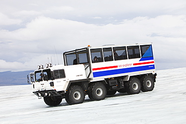 A twenty ton ice explorer truck owned and run by Arngrimur Hermannsson (Arni), taking tourists onto the Langjokull ice cap, Iceland, Polar Regions