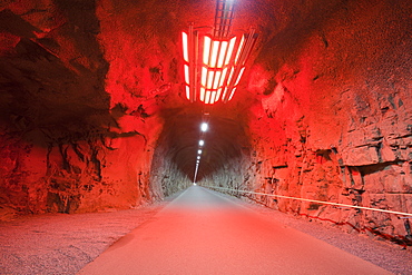 Red light art installation in the entrance tunnel to the underground Fljotsdalur hydro power station, part of Karahnjukar a massive new contorversial hydro electricity project in North East Iceland, Polar Regions