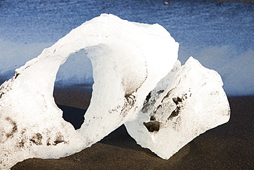 Icebergs from the Jokulsarlon ice lagoon, melting on the beach, Iceland, Polar Regions