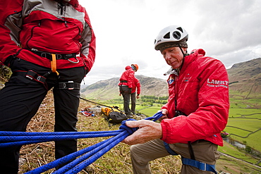 Members of the Langdale Ambleside Mountain Rescue setting up belays on a Team training in the Langdale Valley, Lake District, Cumbria, England, United Kingdom, Europe