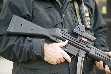 An armed policeman outside the House of Commons, Houses of Parliament, Westminster, London, England, United Kingdom, Europe