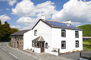 A 3 kilowatt solar voltaic panel array on an old house in Blawith, South Cumbria, England, United Kingdom, Europe