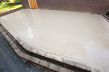 Concrete being poured for a house extension floor, United Kingdom, Europe