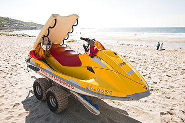 An RNLI jet ski on the beach at Sennen Cove, Cornwall, England, United Kingdom, europe