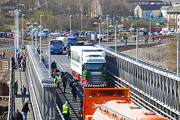 An Eddie Stobart lorry chosen as the first vehicle to cross the new Workington bridge crossing the River Derwent, at the official opening, Cumbria, England, United Kingdom, Europe