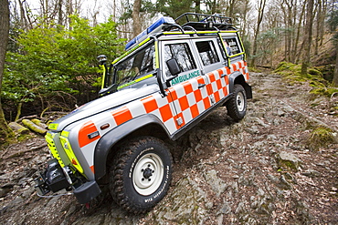 Langdale Ambleside Mountain Rescue Team Landrover off road on a mountain rescue above Ambleside in the Lake District, Cumbria, England, United Kingdom, Europe