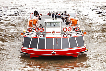 A tourist boat trip on the River Thames in London, England, United Kingdom, Europe