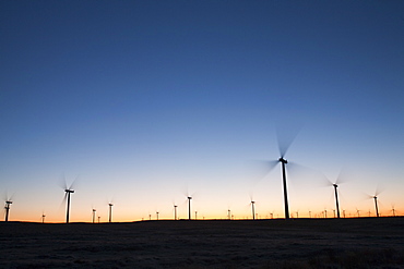 Dawn over Whitlee wind farm on Eaglesham Moor just south of Glasgow in Scotland, United Kingdom, Europe