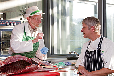 A local venison butcher and a chef at Kendal College explain to catering students how to butcher and cook venison, Cumbria, England, United Kingdom, Europe