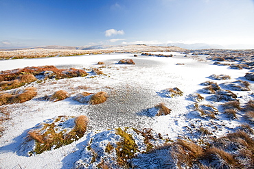 A frozen tarn on Plaice Fell in the Lake District, Cumbria, England, United Kingdom, Europe