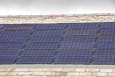 Solar electric panels on Lowick Village Hall in South Cumbria, England, United Kingdom, Europe