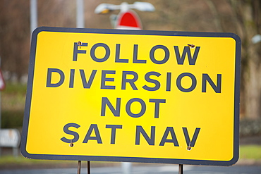 A road sign for a diversion round roadworks in Ambleside, Cumbria, England, United Kingdom, Europe