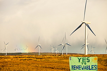 A rainbow over Whitlee wind farm on Eaglesham Moor just south of Glasgow in Scotland, United Kingdom, Europe