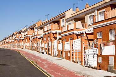 A new build housing development that was abandoned when the Spanish economy collapsed during the recession, causing the developer to become bankrupt, near Sanlucar La Mayor, Spain.