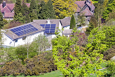 Solar electric panels on a house roof in Ilkley, Yorkshire, England, United Kingdom, Europe