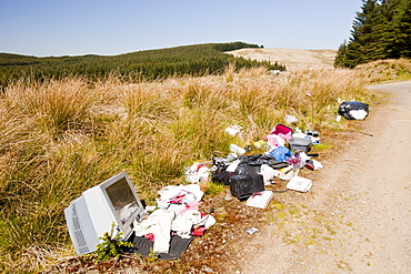 Rubbish illegally fly tipped in the Southern Uplands of Scotland, United Kingdom, Europe