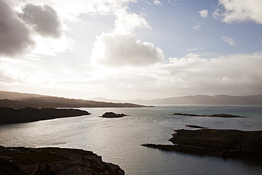 Sunlight over the mountains of Skye from Raasay, Scotland, United Kingdom, Europe