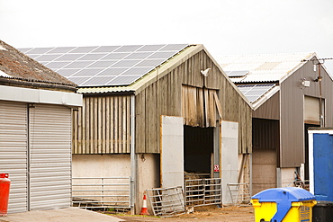 A 35 Kw solar panel system on a barn roof on a farm in Leicestershire, England, United Kingdom, Europe