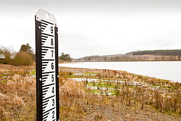 A measuring depth guage left high and dry in early March 2012 at Cropston Reservoir near Loughborough in Leicestershire, England, United Kingdom, Europe