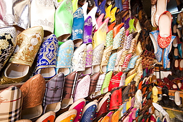 Traditional Moroccan slippers on a stand in the souk in Marrakech, Morocco, North Africa, Africa