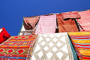 Cloth hanging up a souk in Marrakech, Morocco, North Africa, Africa