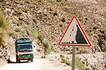 A truck heading into Taroudannt province, on a mountain road in the Atlas mountains of Morocco, North Africa, Africa