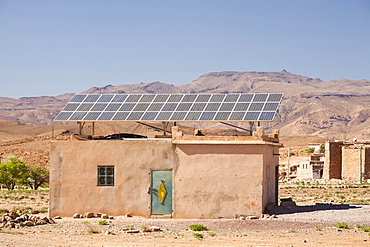 Solar panels on a house roof in a Berber village in the Anti Atlas mountains of Morocco, North Africa, Africa