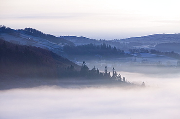 A temperature inversion leading to valley mists in Ambleside, Lake District, Cumbria, England, United Kingdom, Europe