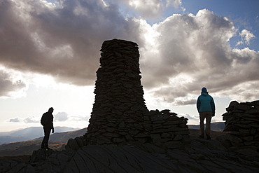 Women walkers next to Thornthwaite Beacon in the Lake District, Cumbria, England, United Kingdom, Europe