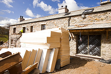 Insulation blocks going into the building conversion at the Hyning in Grayrigg, an old farmhouse and barns being converted into eight holiday letting properties, near Kendal, Cumbria, England, United Kingdom, Europe