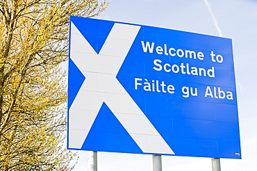 A welcome to Scotland sign on the side of the M74 at Gretna Green, Dumfries and Galloway, Scotland, United Kingdom, Europe