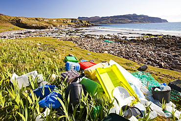 Plastic rubbish washed up at the Singing Sands on the west coast of the Isle of Eigg, Scotland, United Kingdom, Europe