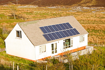 A house with solar panels at Elgol on the Strathaird Peninsula, Isle of Skye, Scotland, United Kingdom, Europe