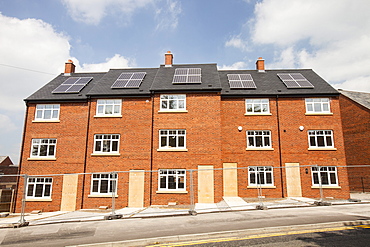 Solar panels on new build housing in Macclesfield, Cheshire, England, United Kingdom, Europe