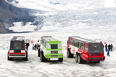 Tourist ice buggies on the Athabasca Glacier, Jasper National Park, UNESCO World Heritage Site, Alberta, Canadian Rockies, Canada, North America