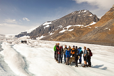 Meltwater channels and tourists on the Athabasca Glacier, Jasper National Park, UNESCO World Heritage Site, Alberta, Canadian Rockies, Canada, North America